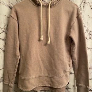 Cream colored hooded sweatshirt